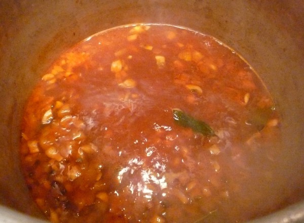 Simmer the fish Espagnole stock